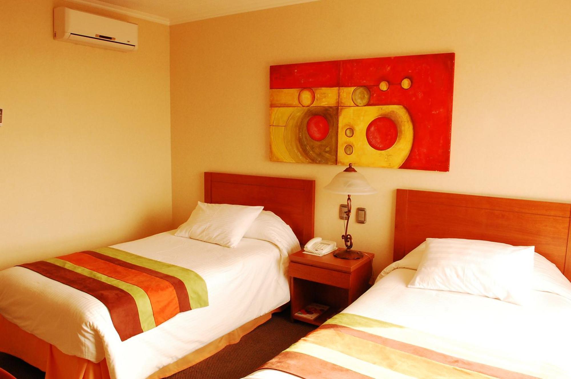 Hotel Florencia Suites & Apartments Antofagasta Quarto foto